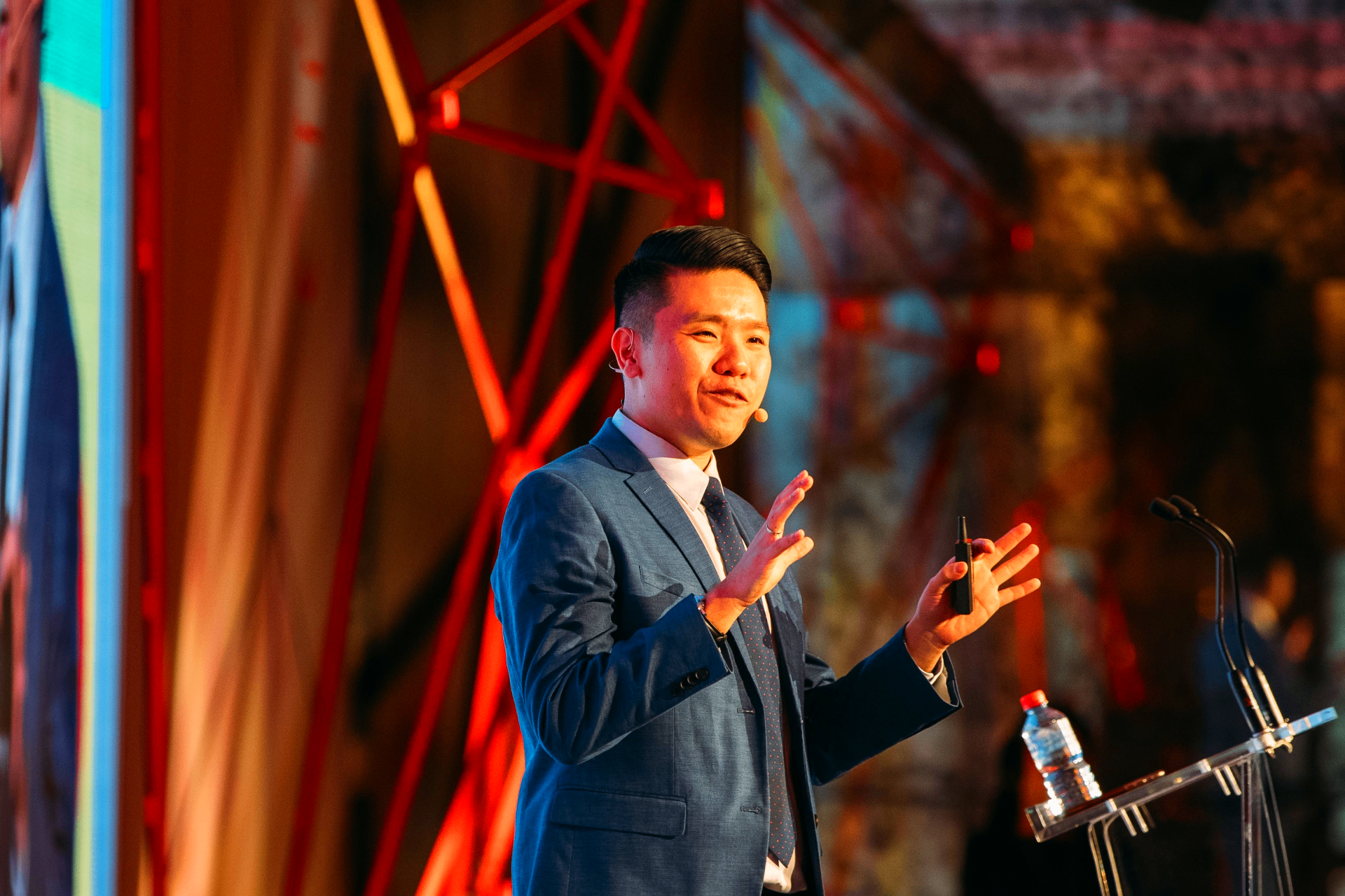 Benjamin Loh speaking on stage